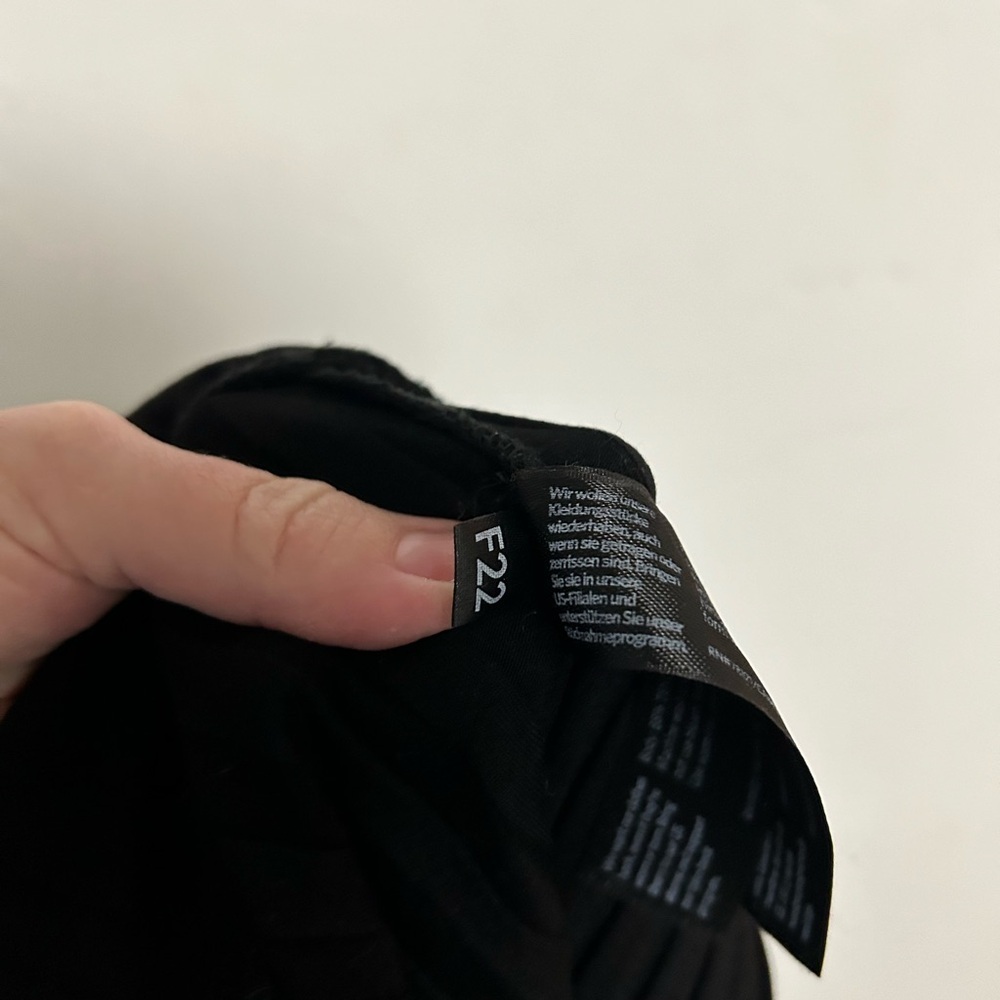 Eileen Fisher ribbed black pants with ankle slit and lettuce hem - Picture 7 of 9